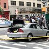 Driver Jumps Second Avenue Curb, Pinning Woman Against Light Pole